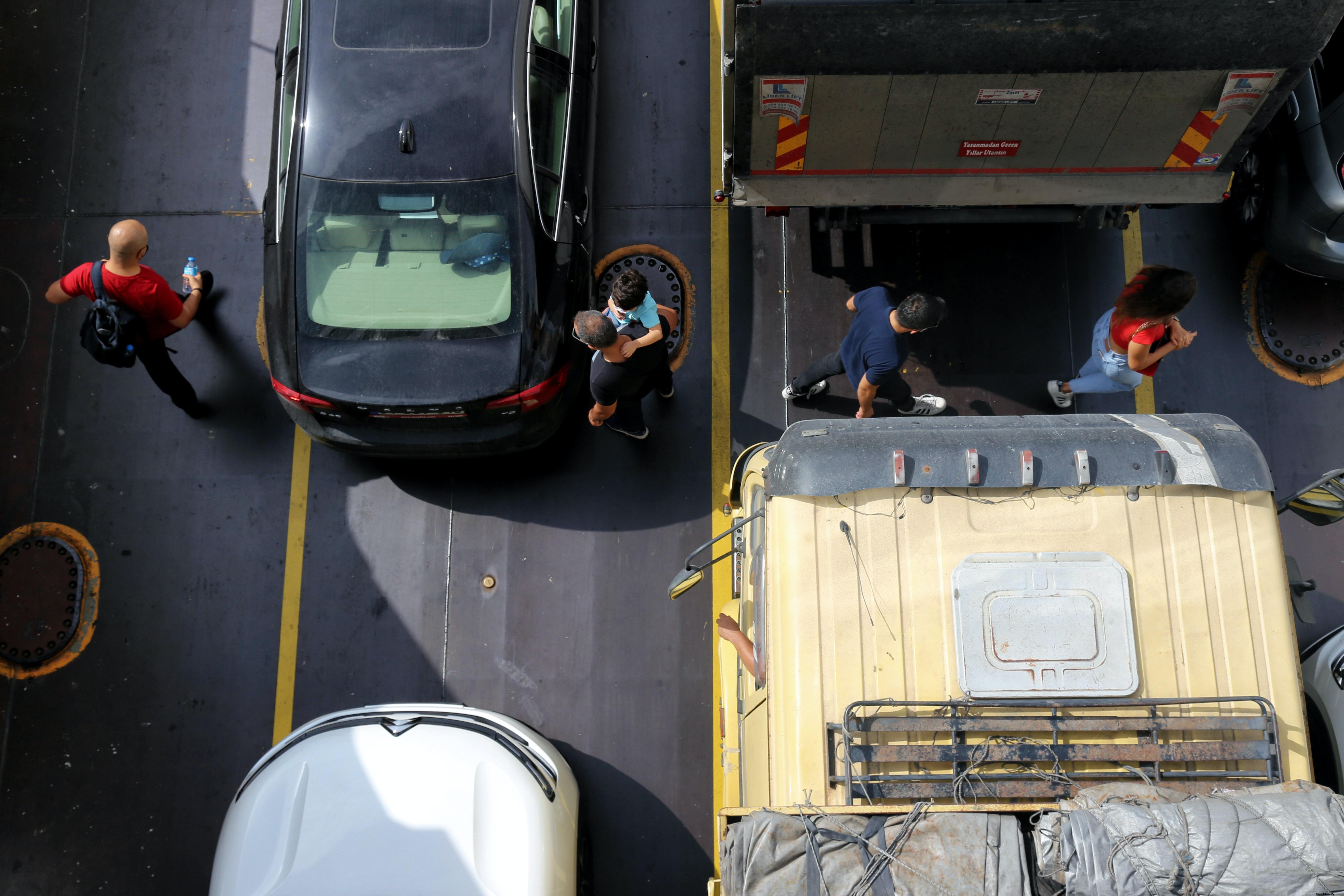 Stunning Aerial Snapshot of Pedestrians Navigating Stalled Traffic