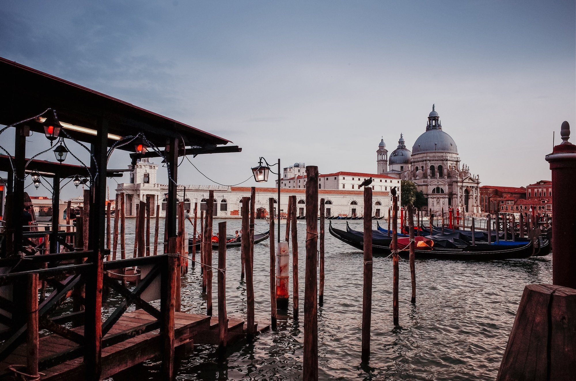Staircase to the Sea: Boats Tied to Tall Poles