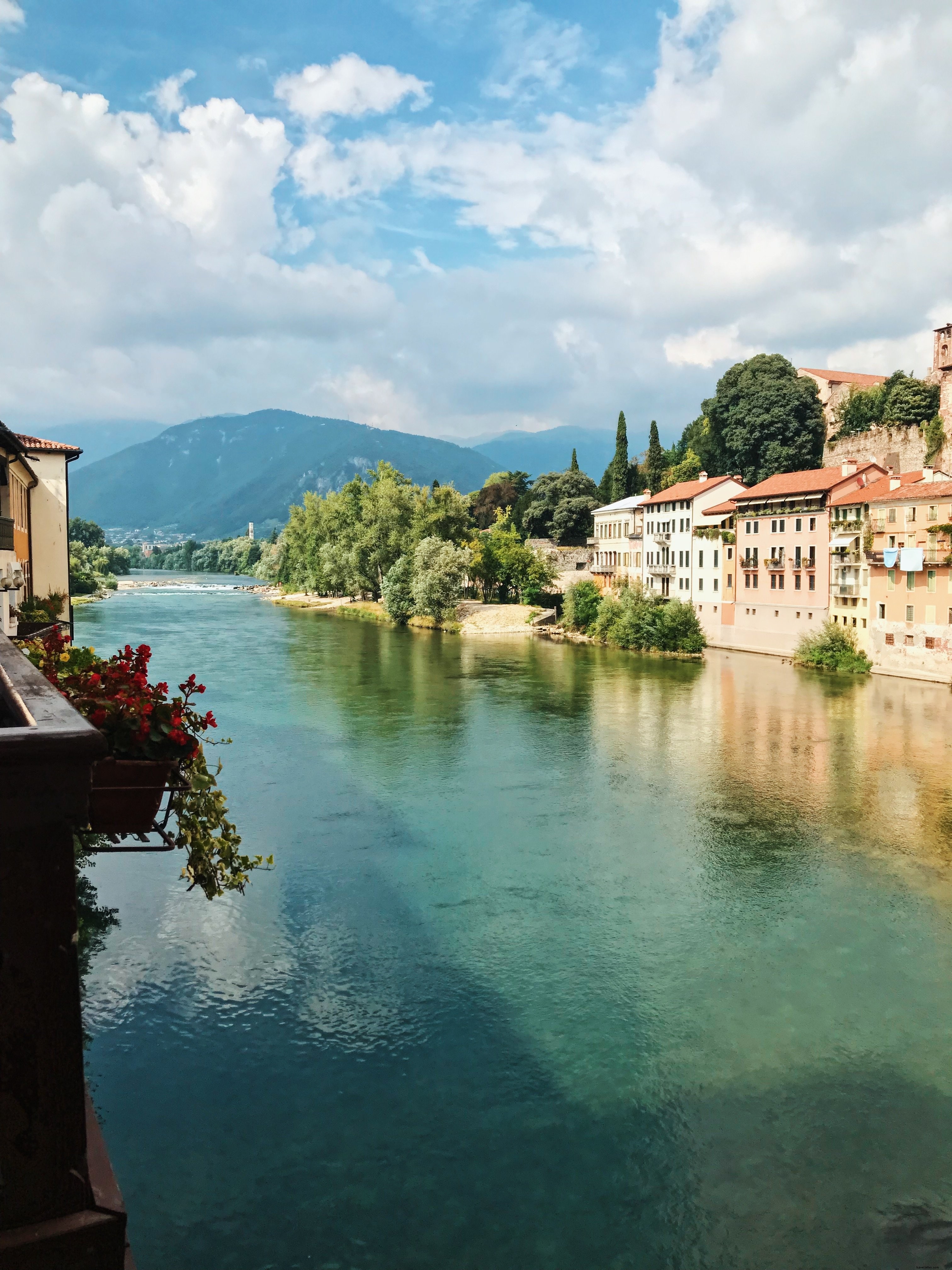 Aqua Blue River Scene Lined with Buildings – Stunning Visual