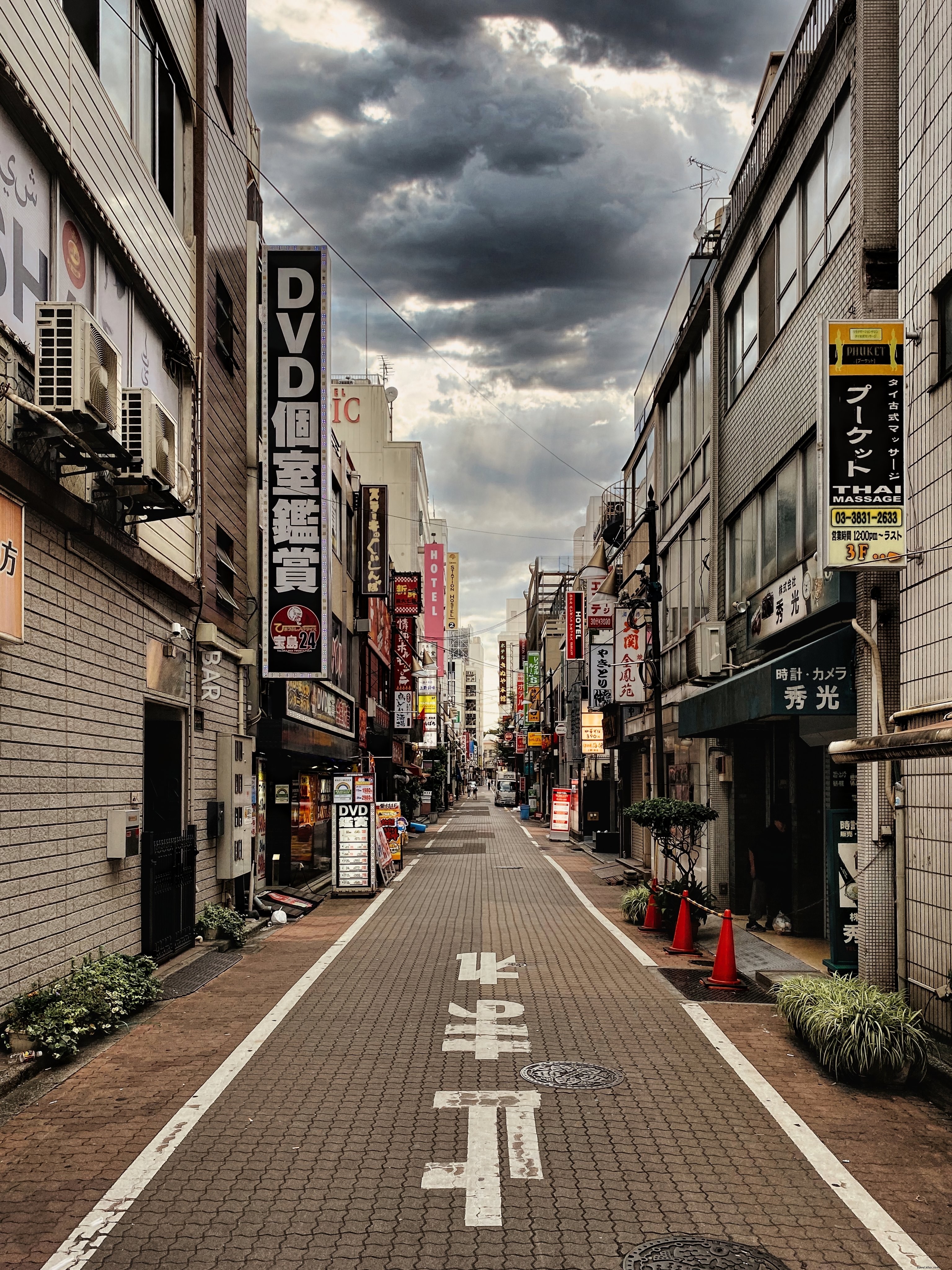 City Street View Under Storm Clouds – Dramatic Urban Photo