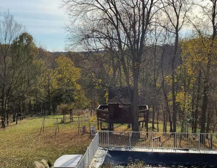 Woodland Hills – A 70‑Acre Log Cabin Retreat in Kentucky’s Rolling Hills