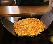 Okonomiyaki: Japan s Customizable Pan-Fried Cabbage Delight